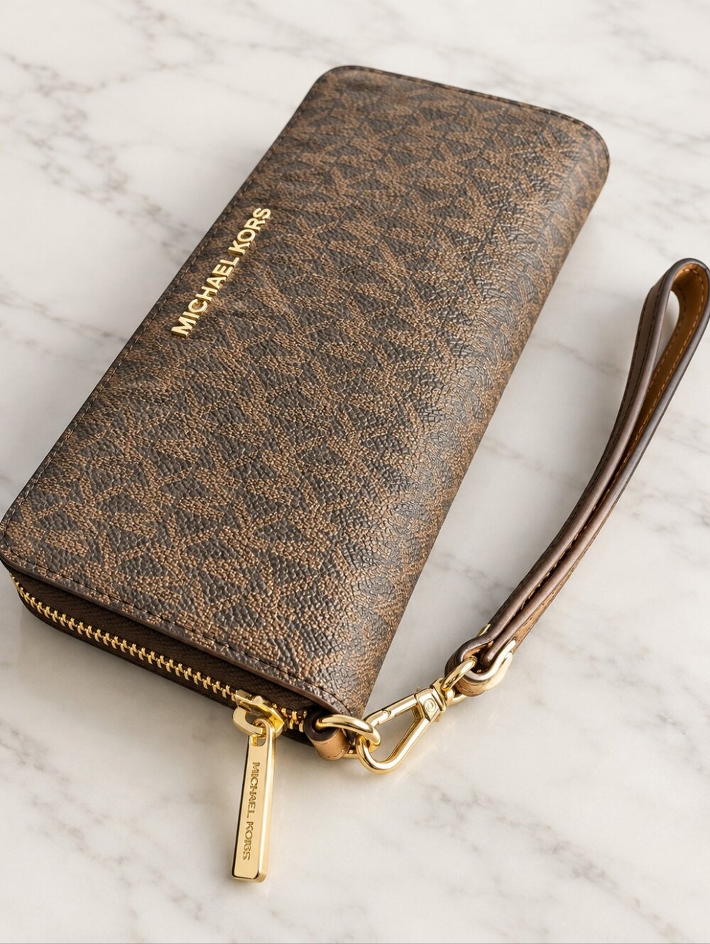 Michael Kors Brown Monogram Zip Wristlet with Gold Hardware